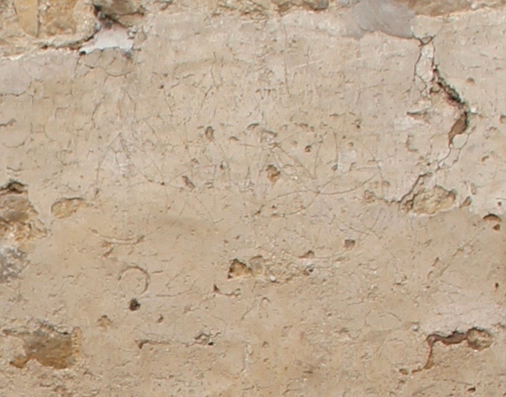 Daisy Wheel Witch Marking on Lime Plaster
